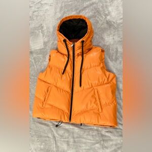 Orange you glad I’m not sold yet! Check out this beautiful puffer vest! 😍🍊😁